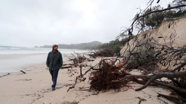 Australia’s Byron Bay beaches ‘severely eroded’ as heavy rain batters the country